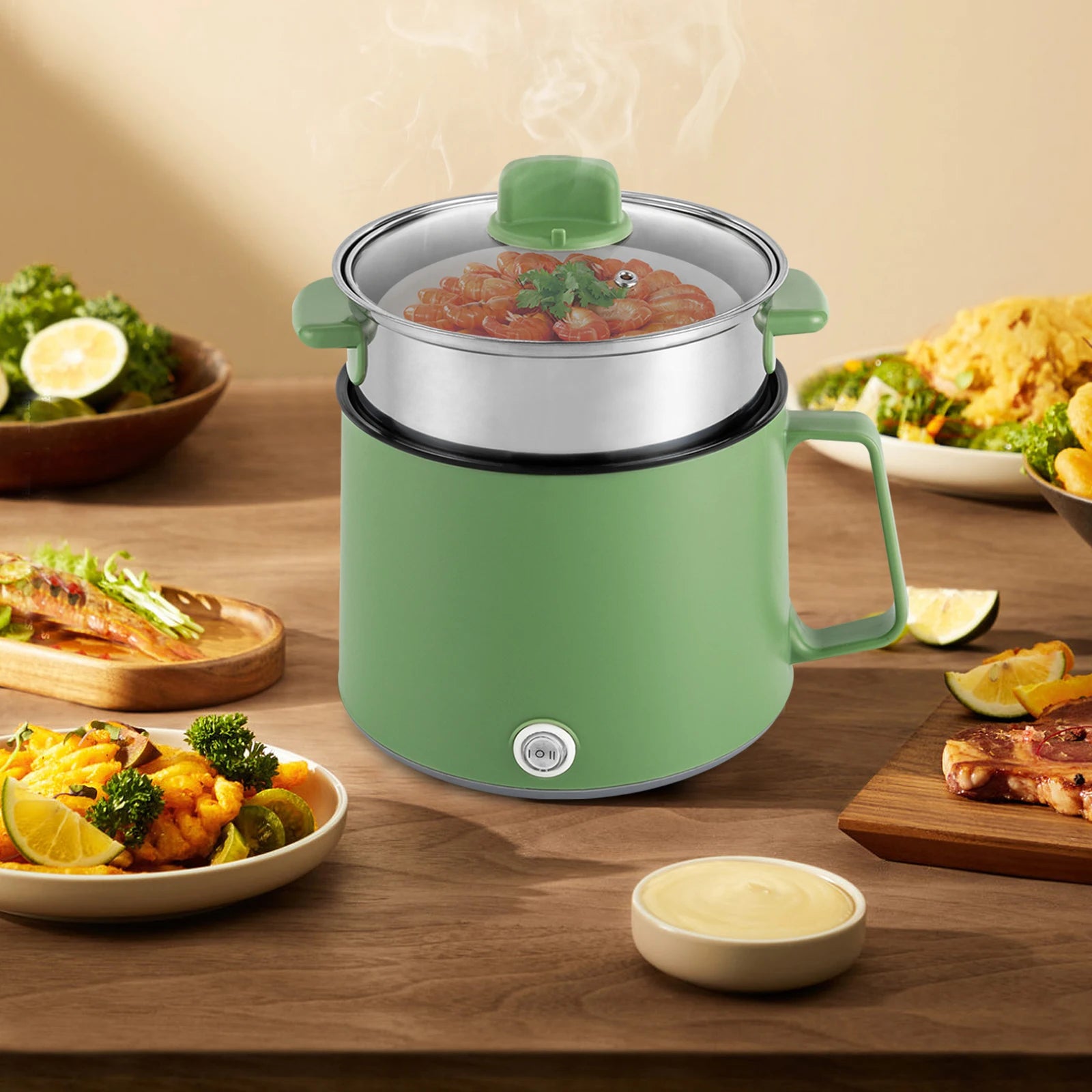 Mini cuiseur vert, crevettes cuites à la vapeur